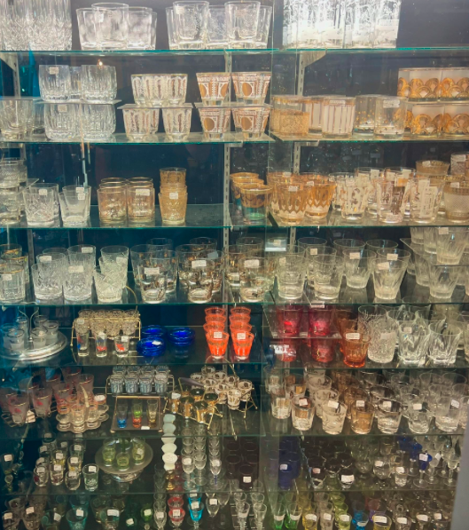 Vintage colored glass and fine china display cases